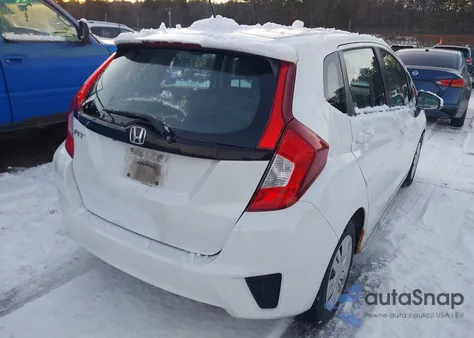 2015 Honda Fit Lx from USA, damaged, VIN 3HGGK5G59FM719648